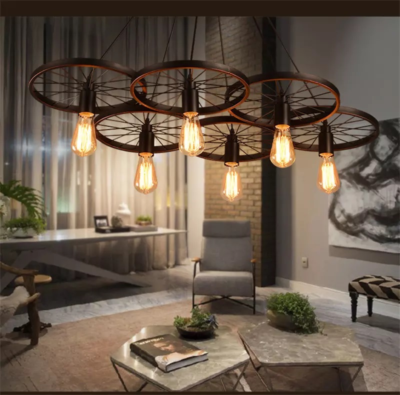 Rustic 6 Bulb Wagon Wheel Chandelier. Popular in Bars, Hotels, Restaurants, Cafes, Showrooms, Offices and Homes for a Rustic Farmhouse Look.
