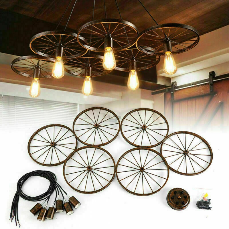 Rustic 6 Bulb Wagon Wheel Chandelier. Popular in Bars, Hotels, Restaurants, Cafes, Showrooms, Offices and Homes for a Rustic Farmhouse Look.