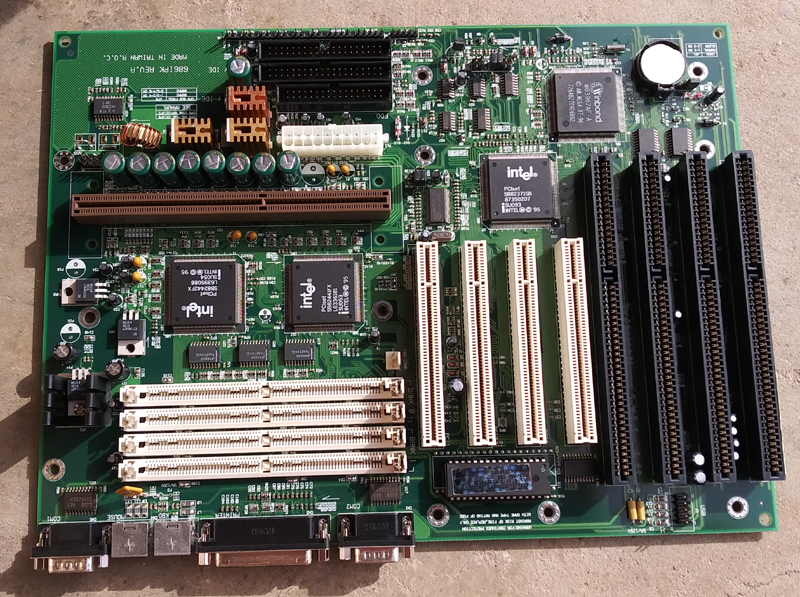 DFI 686IPK Slot 1 ATX motherboard with 4 ISA slots, 4 PCI slots, 1 shared