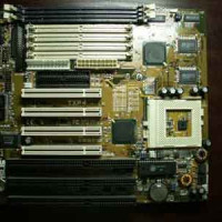 Asus TXP4 motherboard with 3 ISA slots. Baby AT form factor.