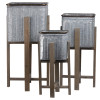 Urban Trends Collection Metal Square Planter with Copper Rim Mouth & Rounded Edges, Vented Pattern Design Body, Wooden Detachable Leg Stand - Galvanized Finish - Gray - Set of 3