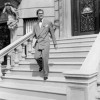 Posterazzi Young Man Walking Down Steps Poster Print - 18 x 24 in.